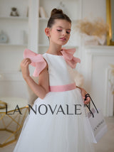 Minimalist flower girl dress with ruffled organza capelet