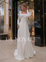 Modest crepe wedding dress with full sleeves
