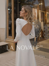 Modest crepe wedding dress with full sleeves