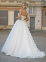 Botanical lace bustier wedding dress with pleated shawl