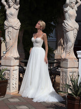 Bustier ivory wedding dress with crystal decor