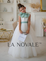Minimalist flower girl dress with ruffled organza capelet