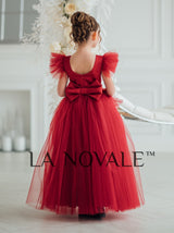 Girls bespoke wedding guest dress with flutter sleeves