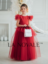 Girls bespoke wedding guest dress with flutter sleeves