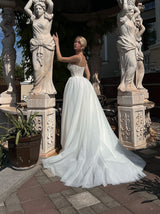 Bustier ivory wedding dress with crystal decor