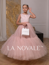 Simple knee length flower girl dress with full overskirt