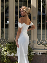 Fitted ruched wedding dress in satin