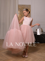 Simple knee length flower girl dress with full overskirt