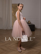 Simple knee length flower girl dress with full overskirt