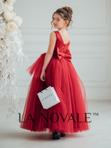 Dark red peplum flower girl dress with ostrich feathers