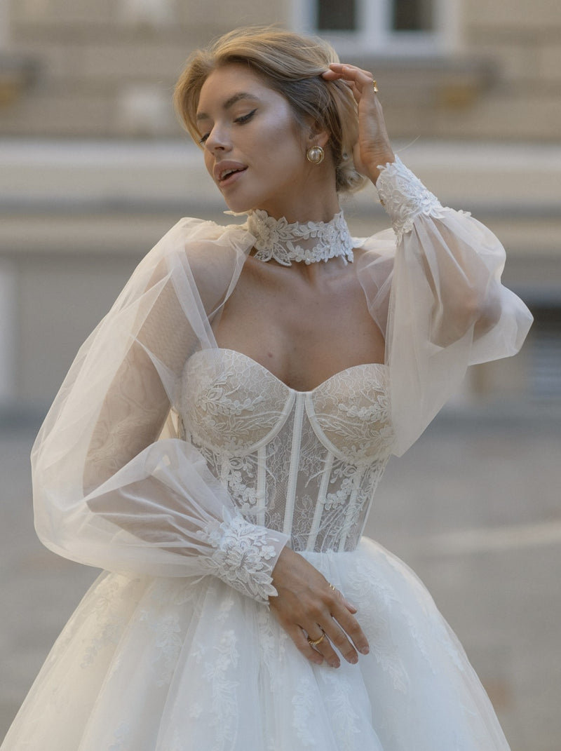 Botanical lace bustier wedding dress with pleated shawl Botanical lace bustier wedding dress with pleated shawl