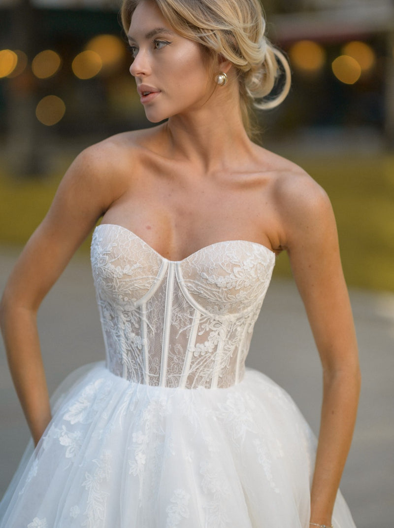 Botanical lace bustier wedding dress with pleated shawl