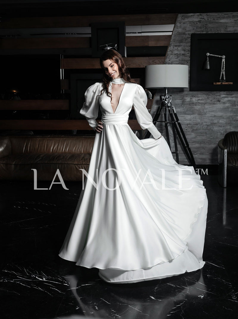 Choker neck A-line bridal gown with full puff sleeves