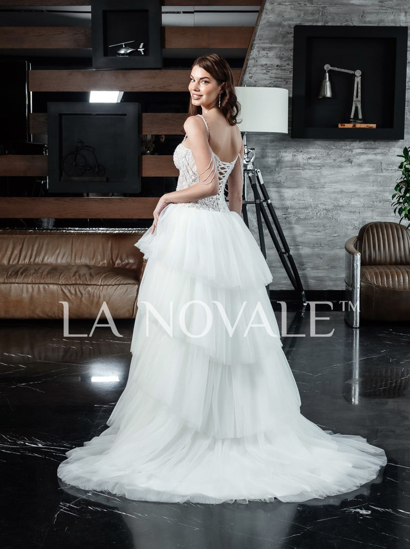 Drop waist corset bridal gown with tiered skirt La Novale Atelier Drop waist corset bridal gown with tiered skirt La Novale Atelier