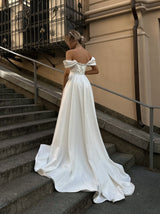 Draped corset glamorous bridal gown with detachable train