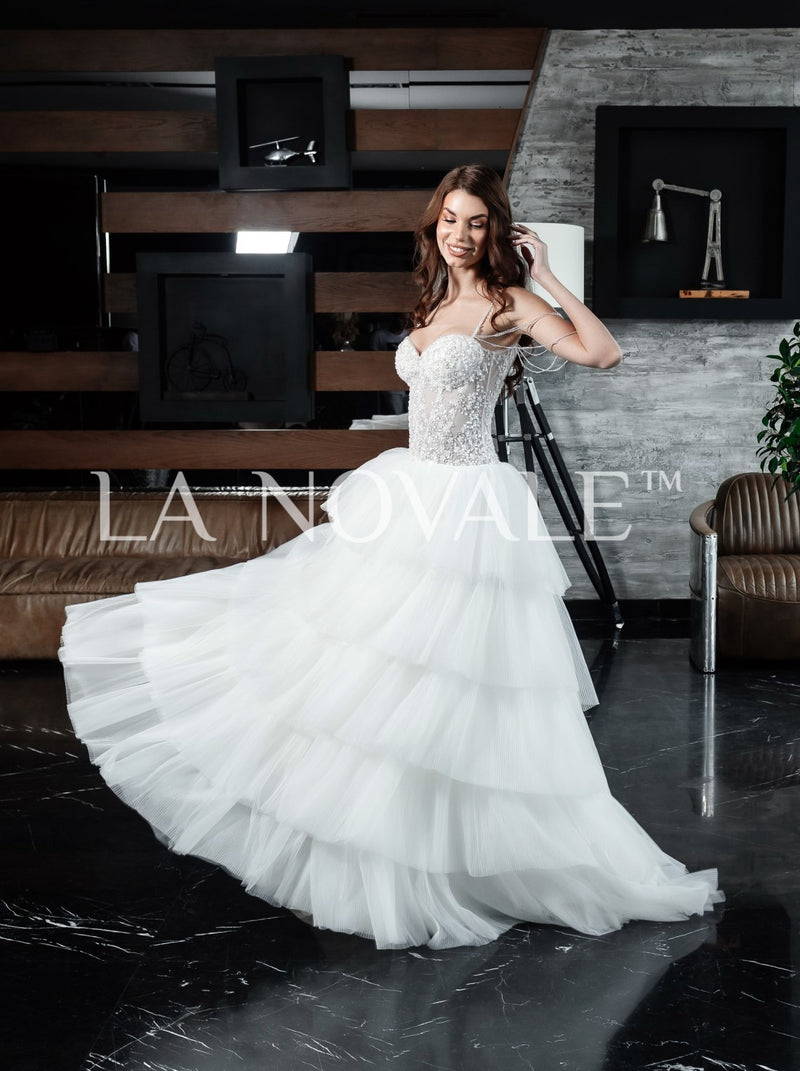 Drop waist corset bridal gown with tiered skirt