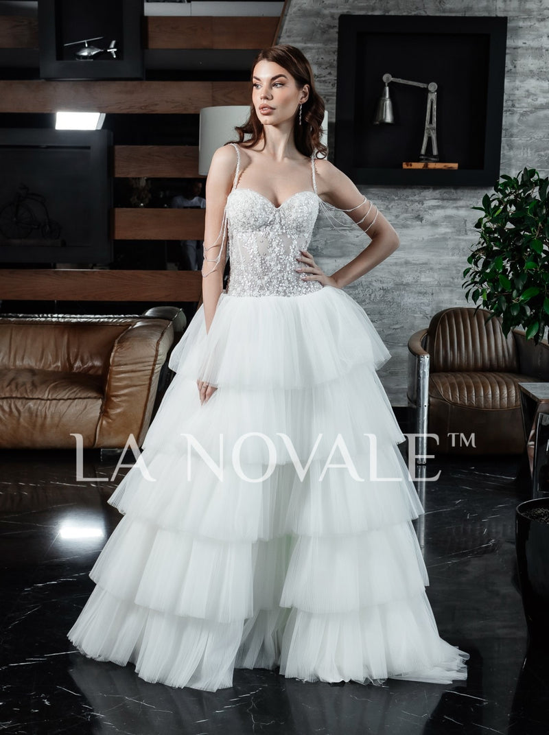 Drop waist corset bridal gown with tiered skirt