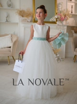 Minimalist flower girl dress with ruffled organza capelet