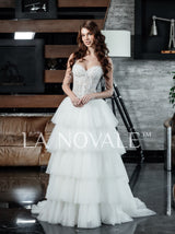 Drop waist corset bridal gown with tiered skirt