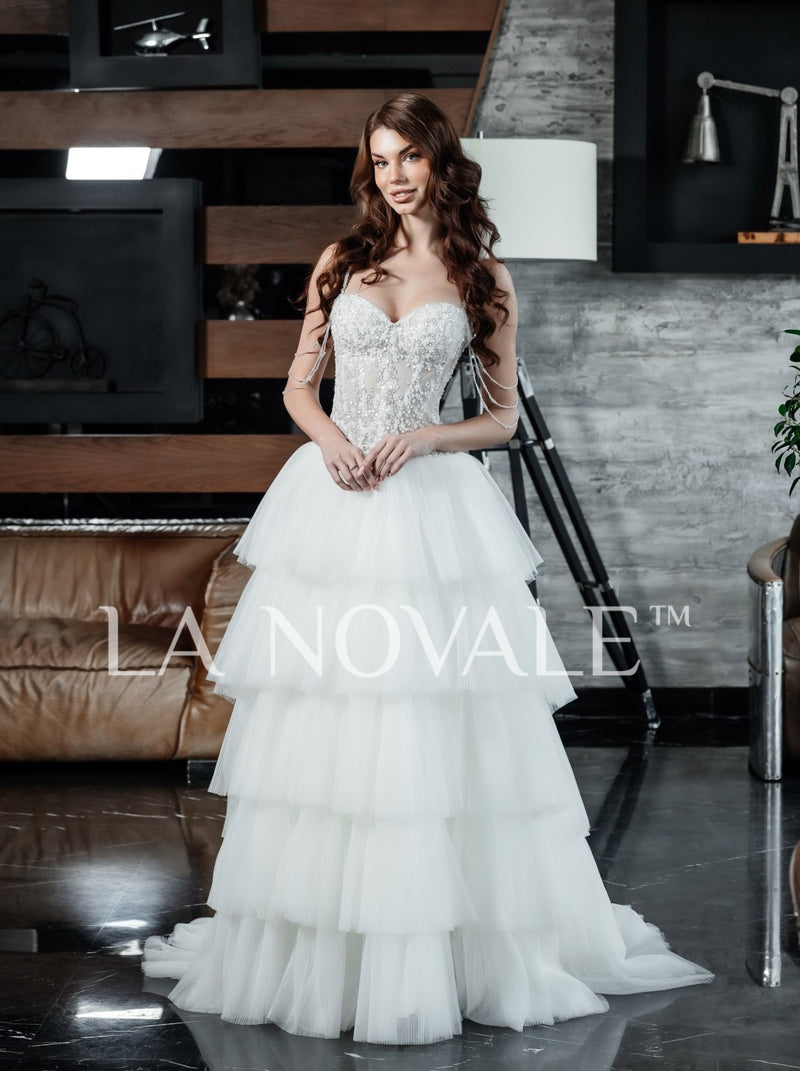 Drop waist corset bridal gown with tiered skirt La Novale Atelier Drop waist corset bridal gown with tiered skirt La Novale Atelier